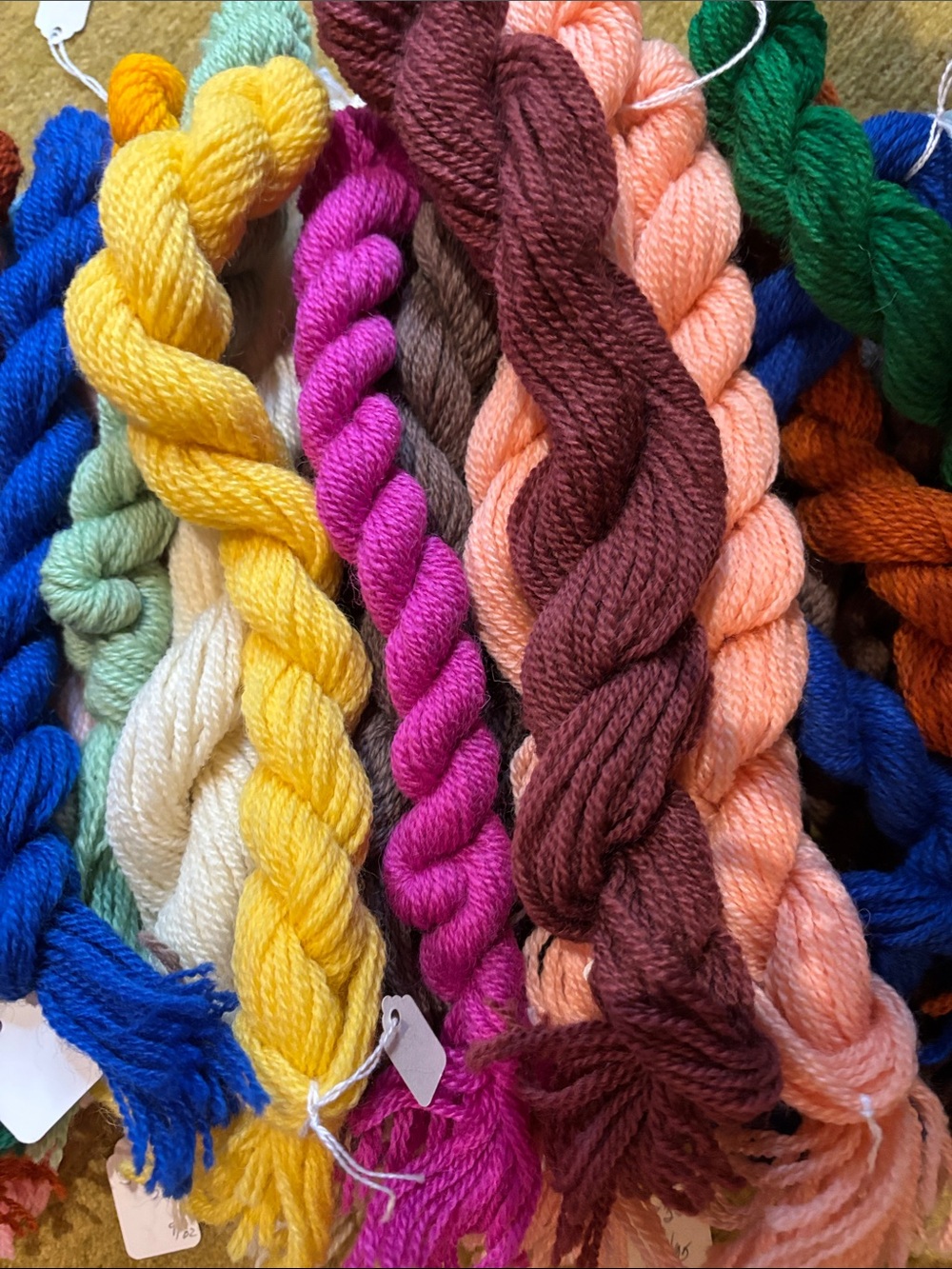 Wool needlepoint and cruel yarn